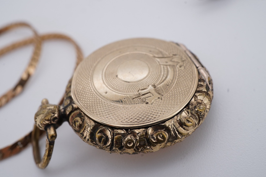 A group of jewels, comprising, a 9ct gold flat curb chain, length 37.5cm, British hallmarks, gross weight 5 grams; a gilt metal locket pendant; an Edwardian gilt metal, green and pink paste brooch; and a silver brooch se